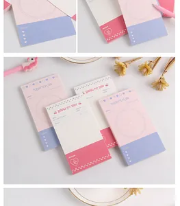 Detail of Korean style memo pads featuring daily planner and mood tracker layouts