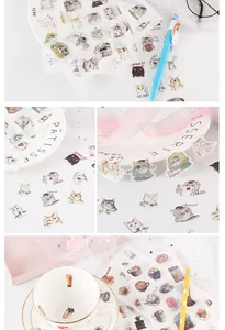 Detailed view of cute cartoon cat and coffee themed decorative stickers for journaling art