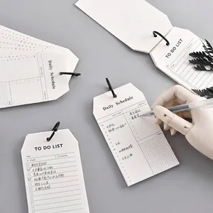 Blocs de notas creativos con anillas para horarios diarios y listas de tareas pendientes.