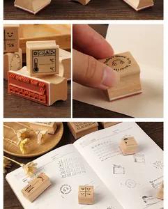 Detailed view of aesthetic wooden stamps with various journal decoration patterns