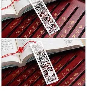 Exquisite lotus pattern hollow stainless steel metal bookmark with traditional red tassel