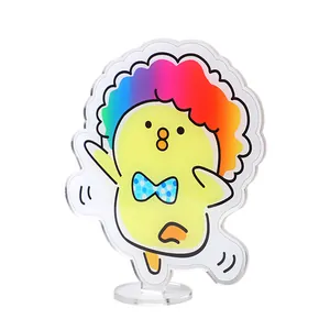 Cute acrylic yellow chick memo clip with rainbow hair for desktop photo display.