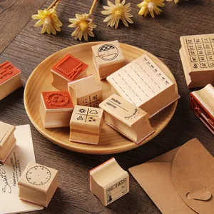 Vintage wooden stamp set with weekly and daily planner designs for journaling