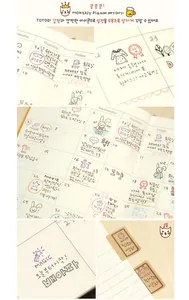 Macro detail view of cute rabbit wooden stamps used in a daily planner diary notebook