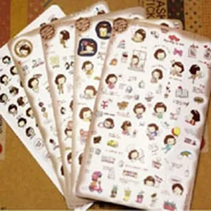 Primo piano di fogli di adesivi decorativi con simpatici personaggi di ragazze a cartoni
