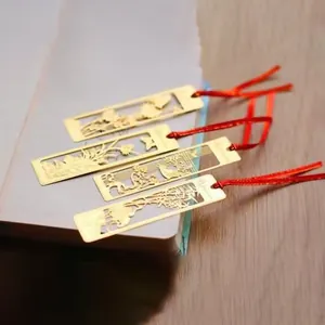 Exquisite traditional Chinese style hollow metal bookmark set featuring red tassels