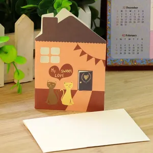 Creative house-shaped hollow greeting card with cute cat design and white envelope