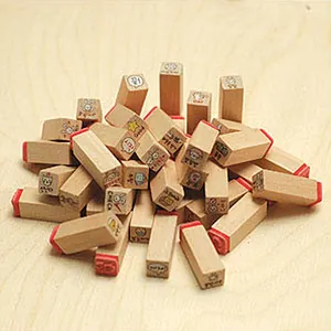 Set of 40 cute bunny wooden stamps for DIY bullet journaling and stationery crafts.