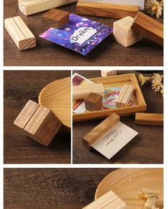 Close-up of vintage wooden card holders in rectangular and cube shapes for desk