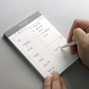 Blocco note minimalista per la pianificazione giornaliera strappabile per l'ufficio