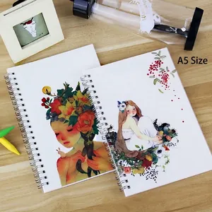 Artistic A5 spiral planner notebook with illustrated girl and floral covers