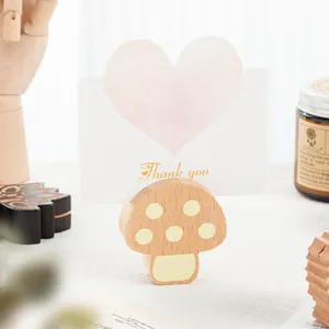 Minimalist wooden mushroom-shaped photo and message clip for desktop decoration