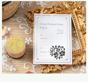 Vintage wooden floral stamp set with floral pattern demo card for DIY journaling and scrapbooking