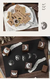 Detailansicht der Vintage-Holzstempel mit Mondphasen und Kalender für das Journaling