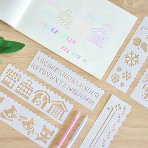 8-piece DIY drawing stencil set with hollow alphabet, numbers and cartoon patterns