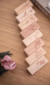 Set of 8 wooden stamps with delicate floral and botanical patterns for DIY journals.