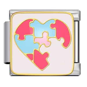Macro detail of a stainless steel Italian charm with a colorful puzzle heart design
