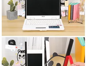 Close-up of acrylic computer monitor memo board with cute cat and panda cartoon designs