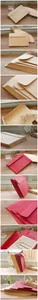 Detalles en primer plano de sobres vintage de papel kraft liso en color natural y rojo.