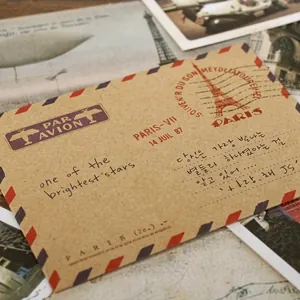 Mini sobres de papel kraft vintage con impresiones decorativas de la Torre Eiffel y correo aéreo