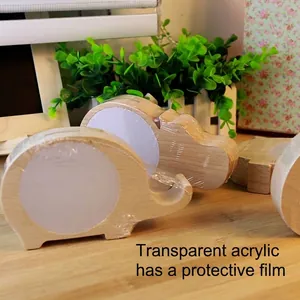 Handcrafted elephant shaped wooden piggy bank with a clear acrylic viewing window