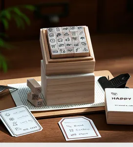 Close-up of 25 wooden stamps with icons for DIY journaling and life decoration