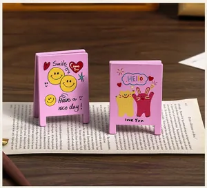 Vintage pink wooden memo holders with cute hand-drawn cartoon smile and cat illustrations