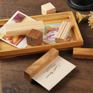 Natural retro wooden place card holders and rustic message clips for table decor