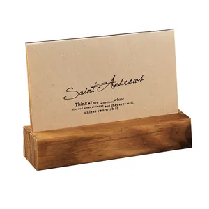 Retro wooden business card holder with natural grain finish for office desk display