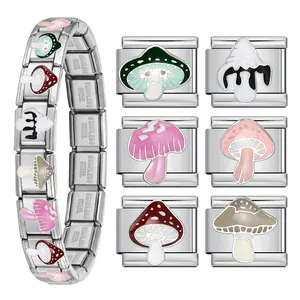 Macro detail of colorful mushroom charms on a stainless steel Italian modular bracelet