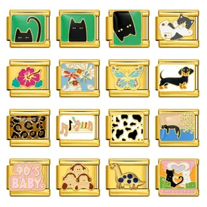 Macro view of various gold-plated enamel Italian charms with cute animal and motif designs.