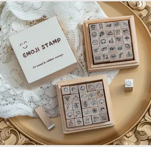 Detail view of 25-piece wooden and rubber stamp set with weather and life icons