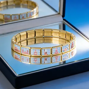 Close-up of gold stainless steel Italian modular bracelet with city landmark charms
