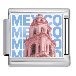 Detail of stainless steel Italian charm link featuring a pink Mexico landmark tower.