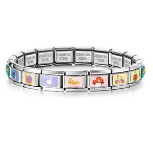 Close-up detail of stainless steel Italian charm bracelet with bee and snail patterns