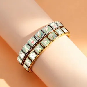 Detailed view of gold and silver Italian charm bracelets with Easter rabbit patterns