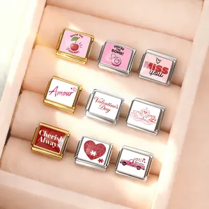 Detailed view of assorted Valentine's Day Italian charm modules in a jewelry box