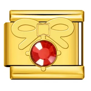 Elegant gold stainless steel Italian charm link featuring a red crystal bow for DIY jewelry