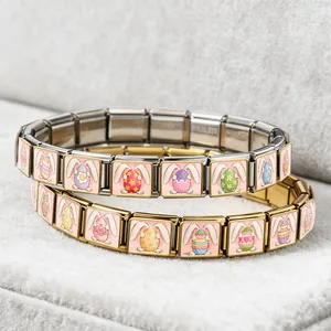 Detailed view of cute Easter bunny and colorful egg designs on stainless steel charms