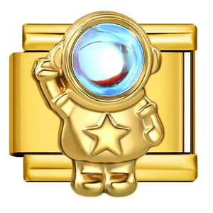 Detailed view of a golden astronaut Italian charm link with blue crystal visor