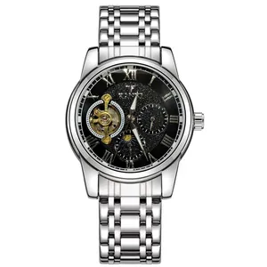 Close-up of luxury men's mechanical watch with black dial and tourbillon