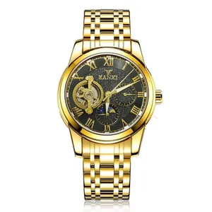 Detail view of men's gold automatic mechanical watch with moon phase and open heart dial