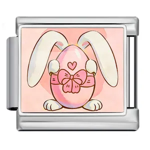 Close-up of Italian modular charm with cute pink Easter egg and bunny ears design.