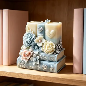 Vue détaillée d'une bougie en forme de livre rétro et fleur faite avec un moule
