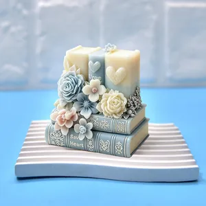 Vue détaillée d'une bougie décorative en forme de livre et rose avec moule silicone