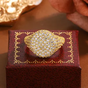 Detailed close-up of luxury 18K gold plated ring featuring full pavé set sparkling crystals