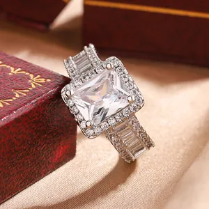 Detailed macro view of a luxury square cubic zirconia halo engagement ring for women