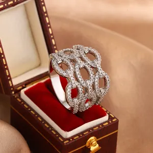 Macro view of a luxury hollow link ring fully paved with sparkling clear cubic zirconia