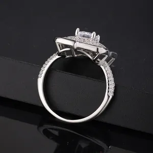 Close-up of exquisite silver flower ring with micro-pave cubic zirconia side view.