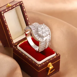 Detailed macro shot of a sparkling horseshoe micro-pave ring inside a vintage gift box